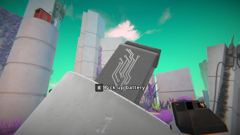 A black and white battery sits at an angle on the top of a pillar. The words "E: pick up battery" are on the screen.