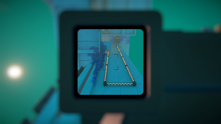 In a camera's viewfinder, there is a teleporter with glowing yellow wires inside.