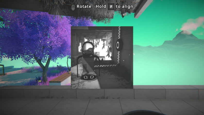 A viewfinder sees a teleporter and a charging pad connected by wires.
