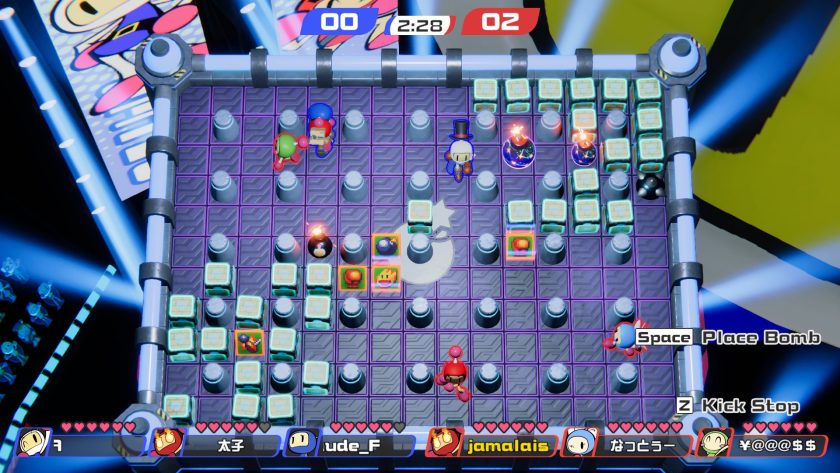 Several players are blasting each other with bombs