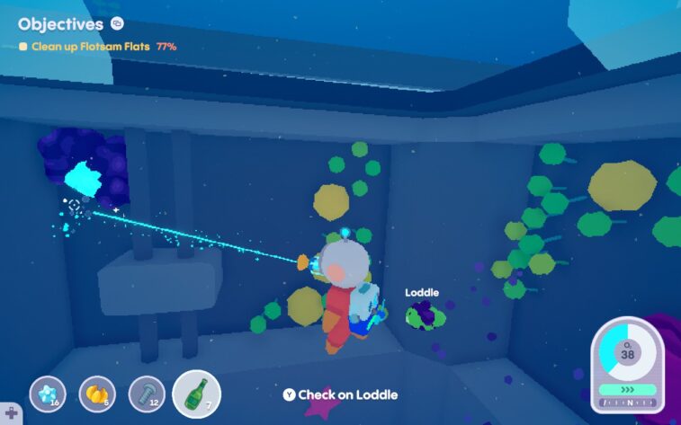 Diver is in a room underwater, shooting at trash with a gun that looks like a laser. A dirty loddle lingers nearby. Plants grow on the wall where it has been cleaned.
