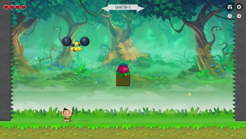 In the vibrant world of Spear Master, a cartoonish warrior character stands ready on a lush, green forest floor at Level 50-2. Three hearts indicate the character's health at the top left corner of the screen, with game settings accessible at the top right. A bomb with a lit fuse and stars hover in the air above, while the warrior appears to be eyeing a large, pink fruit perched atop a brown block in the center. The background showcases mystical trees and a soft, green mist, adding to the game's enchanting atmosphere. Published on: LadiesGamers.