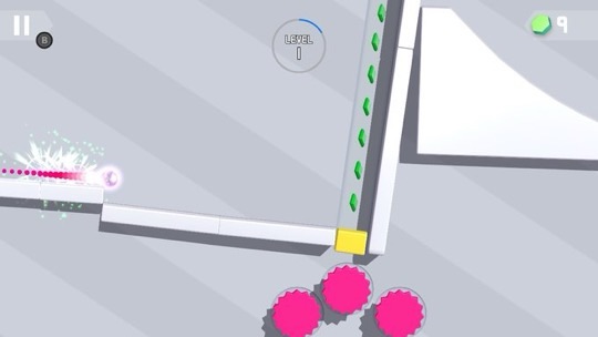 Screenshot of 'Tricky Taps' gameplay showing a sparkly white ball launching from the left and navigating through a maze of grey pathways. The ball aims to avoid pink spiky obstacles at the bottom and collect green diamonds along the vertical path. Interface elements include a pause button, level indicator displaying 'LEVEL 1', and a gem counter with the number 9. The minimalist design features a soft grey background with geometric shapes and simple, bold colors to highlight interactive elements. Published on: LadiesGamers.