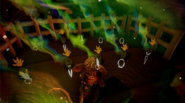 An atmospheric video game screenshot capturing a magical tracking scene. The viewpoint is from above, focusing on the back of an anthropomorphic character wearing a brown cloak and scout uniform, standing on a dirt path. The character seems to be observing or following a trail of glowing green paw prints and white footsteps that appear to float above the ground, suggesting movement of an unseen creature. The trail leads towards a wooden fence surrounded by lush vegetation. Ethereal green and blue wisps float through the air, adding to the mystique of the chase.