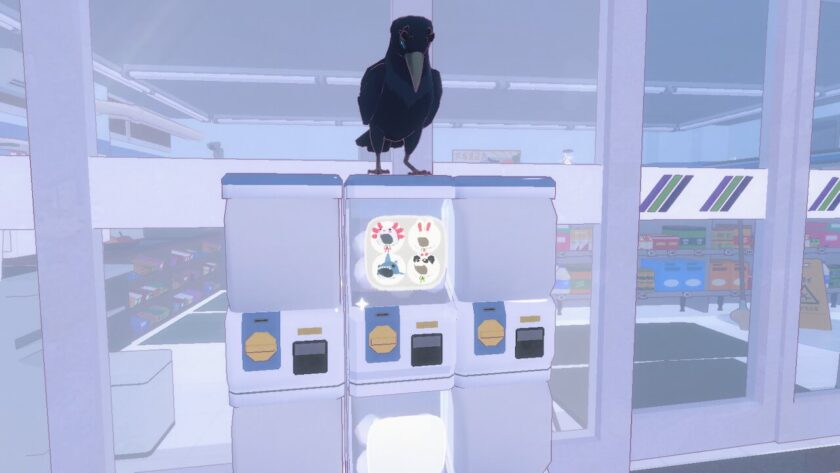 The hat pod machine, similar to a gum drop machine, with the crow sitting on top. There are 4 little hat stickers, showing the hats available at this pod machine.