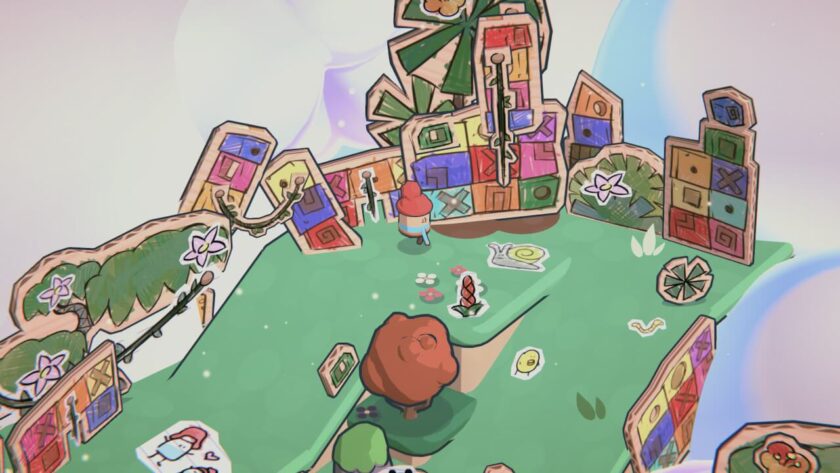 Tyke walking through Pine Hearts, which is now full of cardboard trees and drawings.