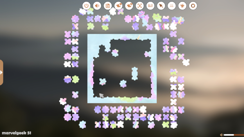 An image from Let's Puzzle showing a partially completed jigsaw puzzle with various coloured pieces scattered around the edges.