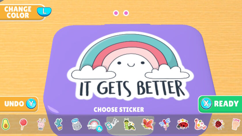 An image from Lunch Box Ready showing a purple lunch with a sticker of a rainbow that says "it gets better" underneath it.