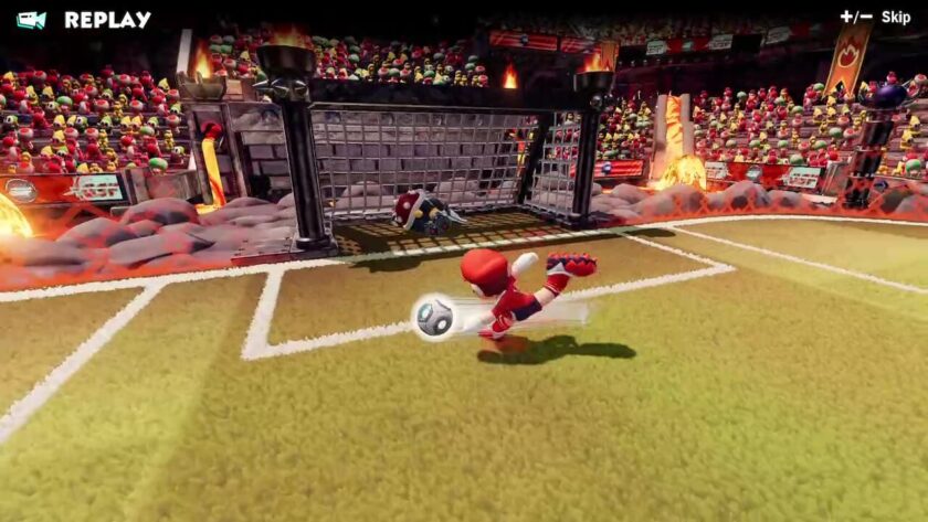 Mario just about to slam the ball into the back of the net.