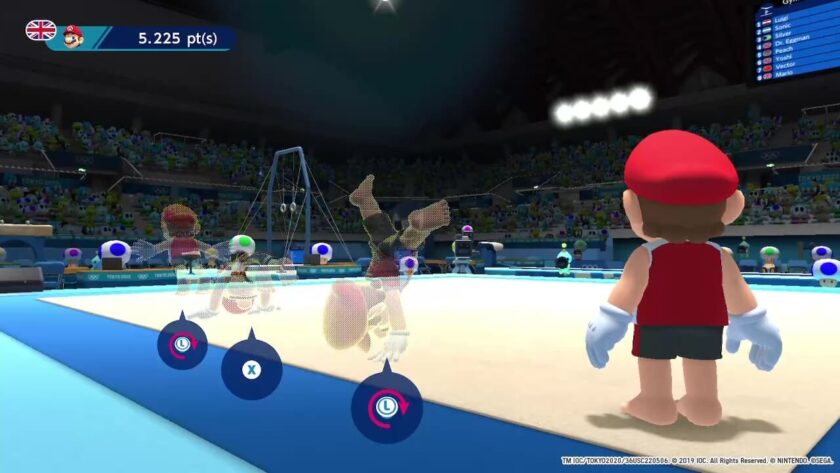 Mario pausing before launching into a 3 stage tumble in the gymnastic floor event.