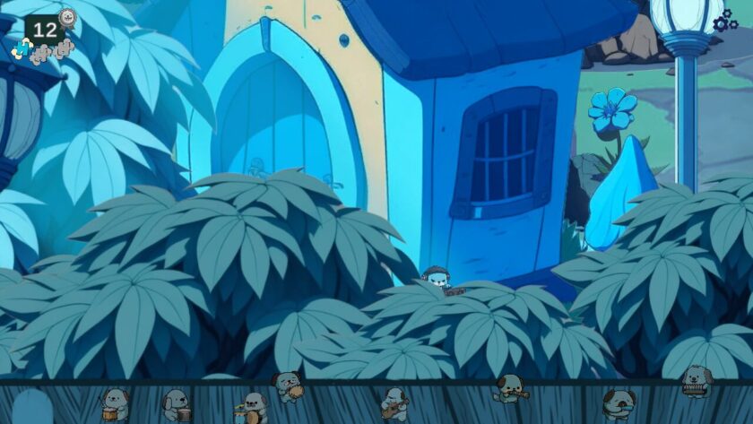 Blue dog wearing headphones and a beanie hat, hiding by a blue-painted house, behind some grey-blue bushes
