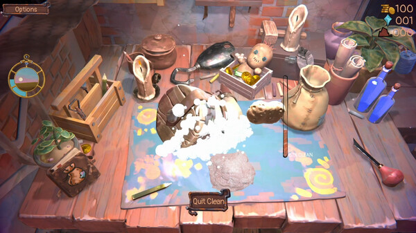 A cluttered workbench filled with various sculpting and cleaning tools is shown, featuring a pottery piece covered in suds in the process of being cleaned. The workspace includes paintbrushes, a sponge, cleaning bottles, and a variety of pots and trinkets. A soft light casts a cozy ambiance over the scene, suggesting a relaxed crafting environment. The game's user interface displays options and resources like currency and health in the upper corners. Published on: LadiesGamers.
