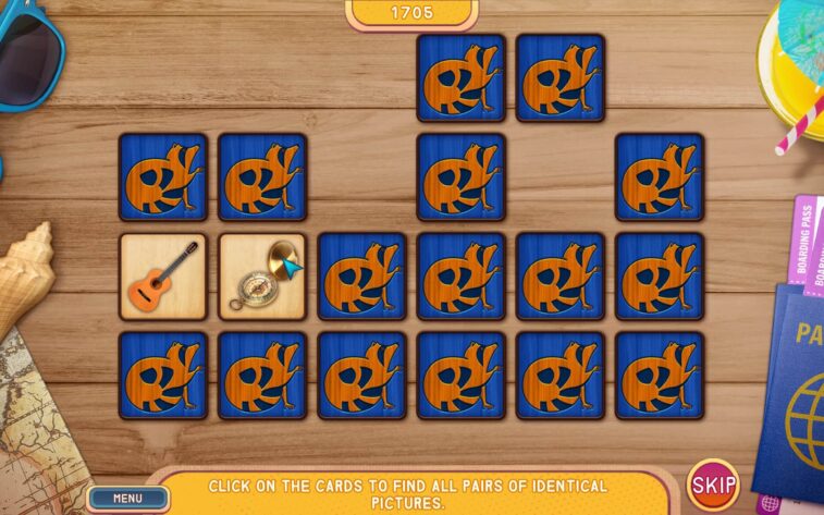 a board with face down cards, two opened - one with picture of a guitar, the other with a compass