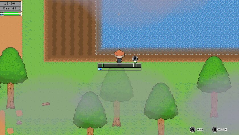 My character fishing by the water in the wasteland. There is a gauge below with a fish symbol at the left, a small green bar in the middle and an area near the right, marked A. Published on: LadiesGamers