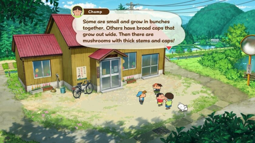 Champ explains different types of mushrooms to a group of kids, including Shin-chan, in front of a rustic house surrounded by lush green scenery. The peaceful countryside environment adds to the game's charm. Published on: LadiesGamers.