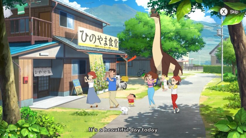 Shin-chan, accompanied by his family and a few townspeople, are outside a local eatery on a bright day, doing their morning exercises with a towering dinosaur statue nearby. The rustic restaurant has a sign in Japanese, and the scene is lively, with everyone smiling and snapping photos as Shin-chan’s pet dog Shiro trails alongside. Published on: LadiesGamers.