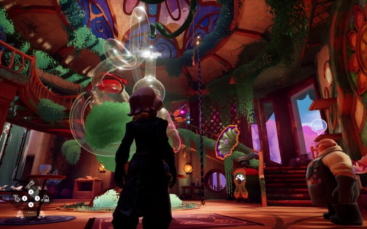 a white-haired woman and a bald man standing in front of a huge glass machine inside of a building with a tree