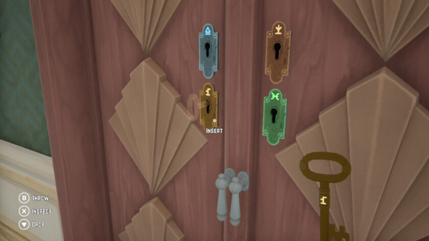 The locked door with 4 keyholes. A brown key with a distinct pattern, is hovering over a lock with the same colour and pattern and the word "insert" appears. Published on LadiesGamers