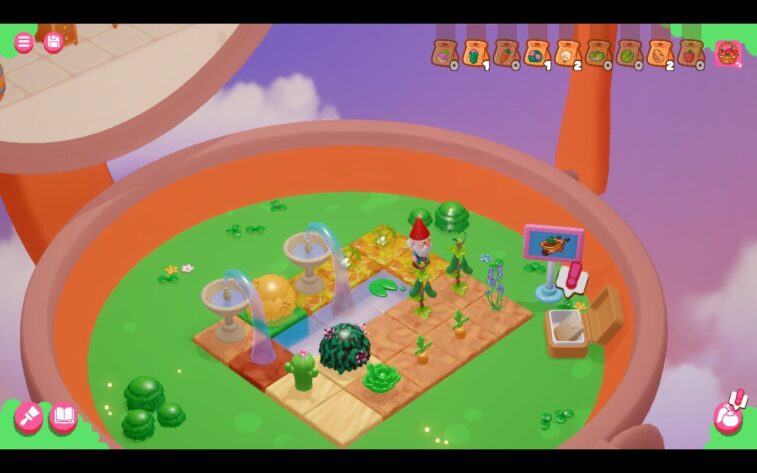 A colorful garden area in Tiny Garden with tiled soil and planted vegetables, including carrots and sunflowers. Two water fountains spray streams onto the crops. A gnome character stands nearby, and a task board with an exclamation mark is on the right. Published on: LadiesGamers
