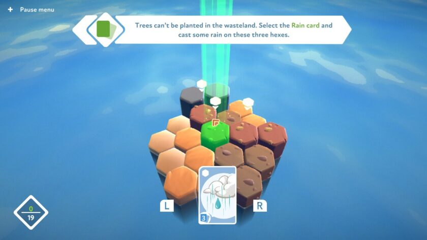 An area of 19 hexagonal tiles, with the instruction to “select the rain card and cast some rain on the three highlighted hexes”. Published on LadiesGamers