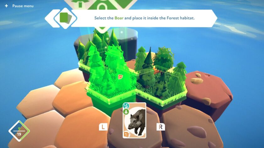 Three hexagonal tiles covered in trees and the instruction to “select the boar and place it within the Forest habitat”. Published on LadiesGamers