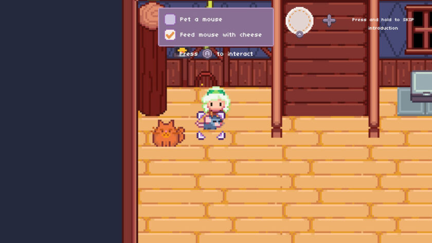 Luna feeding a mouse, with her brother as a cat nearby. Published on LadiesGamers