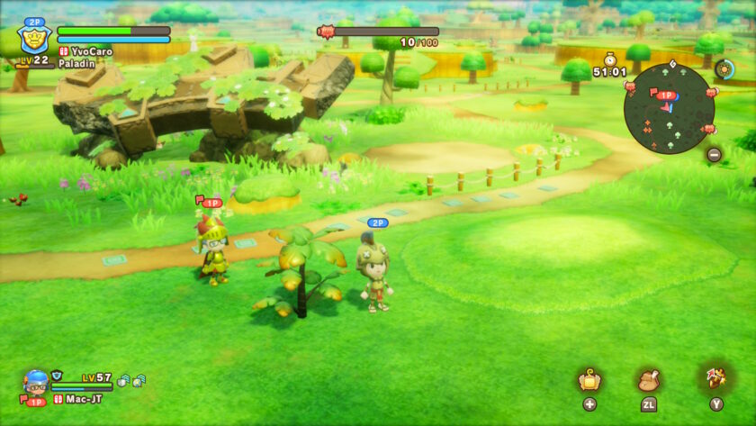 Two players in Fantasy Life I explore a lush, colorful field dotted with ruins and trees. The interface shows player levels, health bars, a minimap, and a timer. One character is a paladin with glasses and a red cap, the other wears a helmet with a feather. Published on: LadiesGamers