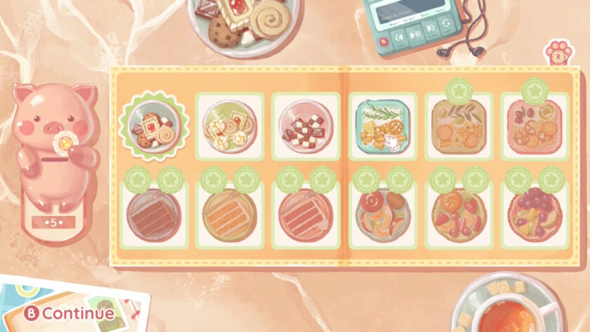 A snack selection menu with a pink piggy bank holding a star token and various colorful snack options displayed in a grid. The player’s pointer highlights a square of mixed crackers, with a cozy tabletop full of treats and tools surrounding the screen. Published on: LadiesGamers