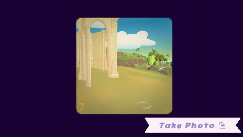 A camera's viewfinder view, showing some ruins, there is an option to “take photo”. Published on LadiesGamers