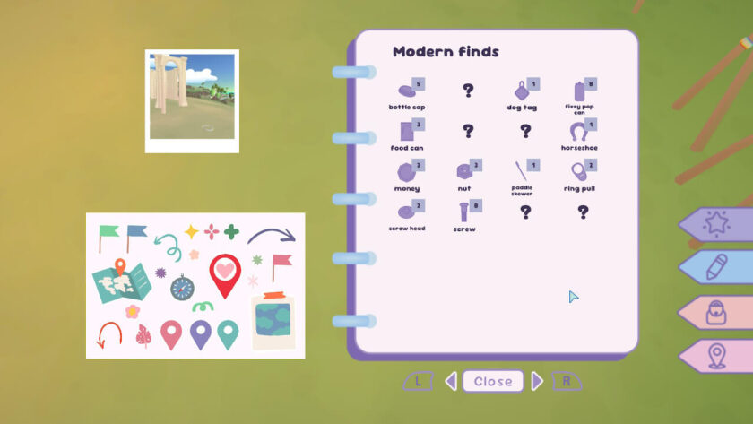 Morgan's journal open on the finds page. There is a photo to the upper left and stickers to the lower left. Published on LadiesGamers