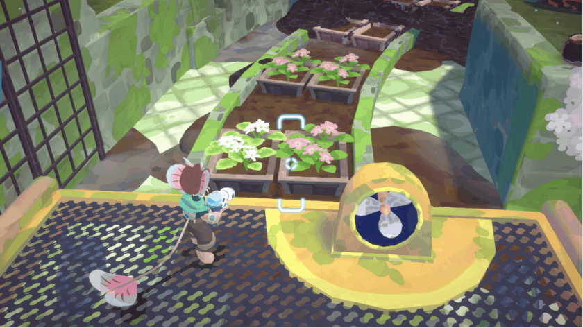 A screenshot from Muri: Wildwoods featuring an anthropomorphic mouse character standing on a grated platform, tending to a row of blooming pink and white flowers. The character, with mouse-like ears and tail, holds a device aimed at the garden beds. Nearby, a yellow machine with a circular screen. The environment includes green stone walls, a black metal gate, and a path leading to more garden beds and dark soil, suggesting a blend of gardening and exploration gameplay. Published on: LadiesGamers.