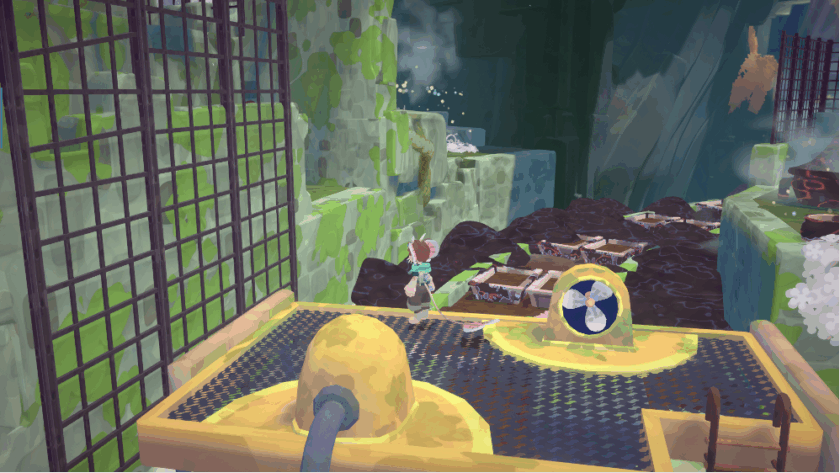 A screenshot from Muri: Wildwoods showing a character standing on a mechanical platform with a fan and dome structure connected by a pipe. The platform is set against contrasting terrain—lush green moss and hazardous black sludge dotted with crates. In the background, a cavernous environment with waterfalls and mist suggests an underground setting rich in exploration and puzzle-solving elements. Published on: LadiesGamers.