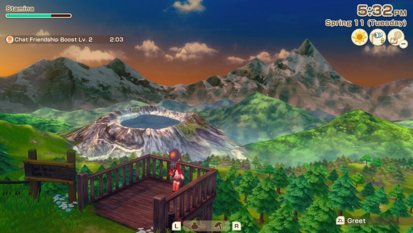 My Best Games of 2025: A screenshot from Story of Seasons: Grand Bazaar shows the female protagonist standing on a wooden viewing platform overlooking a stunning mountain landscape at sunset. In the distance, a crater lake sits nestled among snow-capped peaks and rolling green hills. The foreground features a dense forest of pine trees, and the sky glows with warm orange and purple hues. The interface shows the time as 5:32 PM on Spring 11 (Tuesday), with a notification for “Chat Friendship Boost Lv. 2.” The scene captures a moment of quiet reflection and natural beauty. Published on: LadiesGamers.