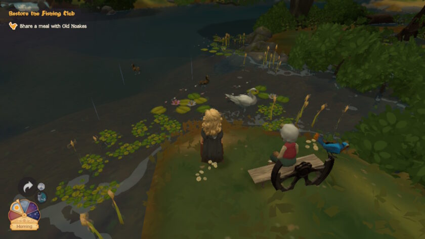 Two characters linger beside a tranquil pond in the soft light of evening. One sits on a bench with a bluebird companion, while the other stands nearby. Lily pads drift on the water's surface as a swan and a pair of ducks glide by. A quest prompt reads “Restore the Fishing Club” and “Share a meal with Old Noakes”, hinting at a gentle tale of friendship and restoration in the world of Tales of the Shire. Published on: LadiesGamers.