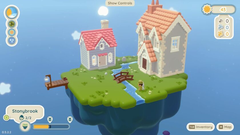 Two houses on an island with red roof and an orange roof