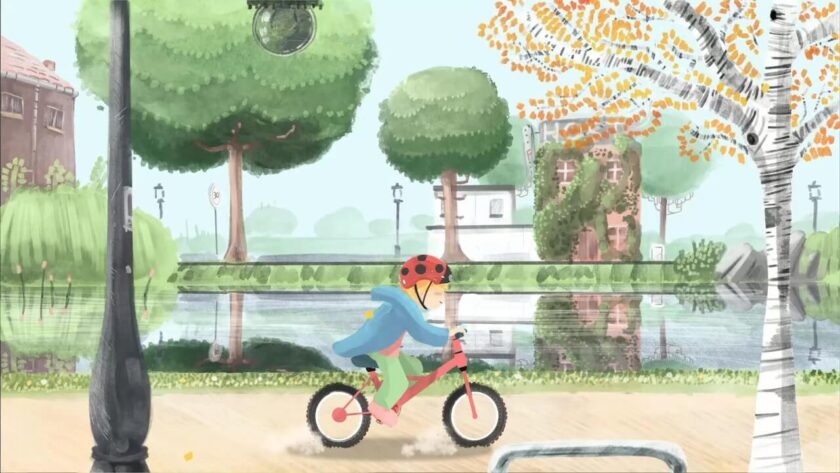 Charlie pedalling past a pond on their way home. Published on LadiesGamers