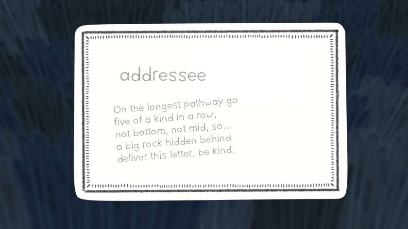 An envelope has a riddle written on the outside of it in Pencil Stories.