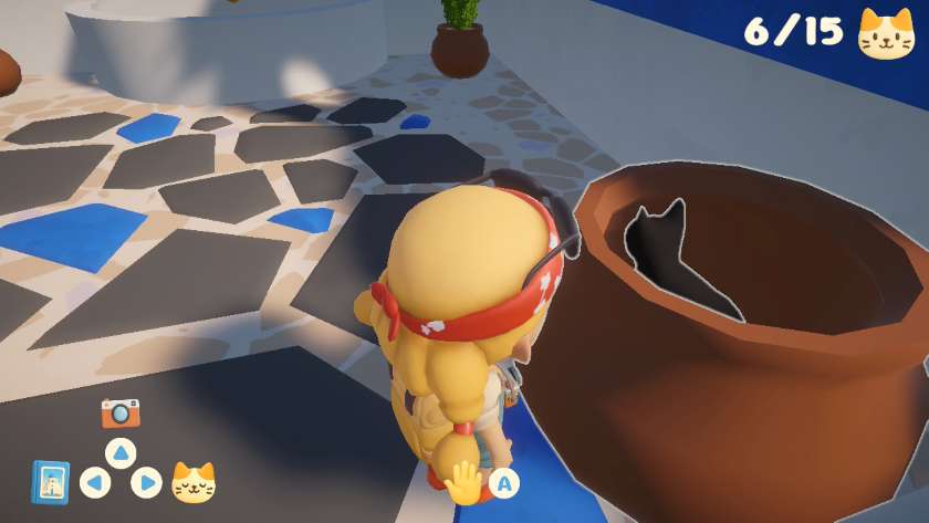 Mia peering into a large terracotta pot, which contains a black cat. Published on LadiesGamers