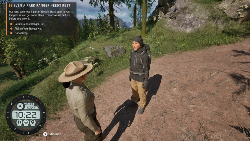 a park ranger talking to a tourist