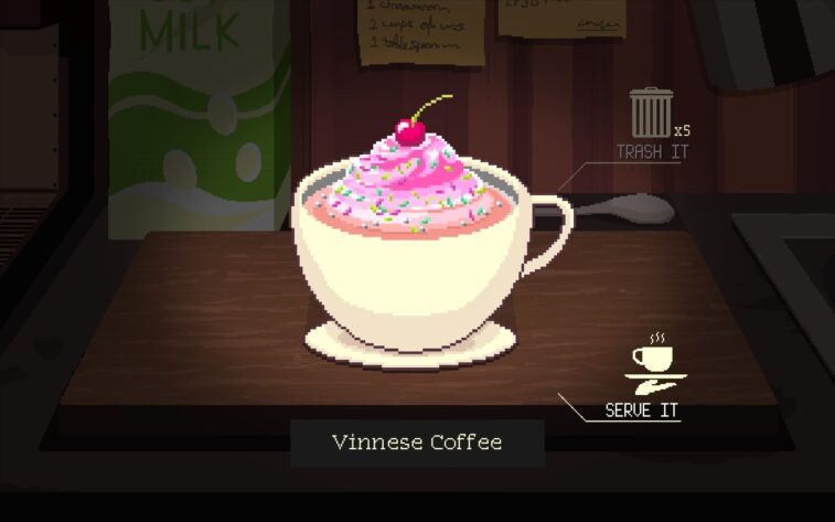 a yellow teacup and saucer with a pink topping and a cherry.