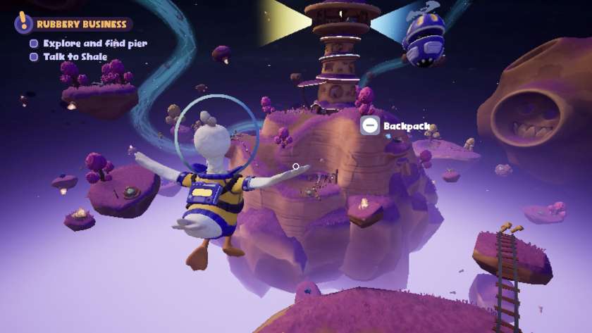 Doug in mid-air facing a large rock with a lighthouse on it. Published on LadiesGamers