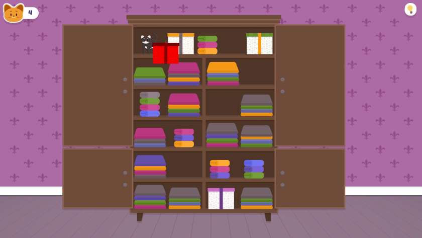 A cat is hidden behind a box in an armoire in Kitty Finder.