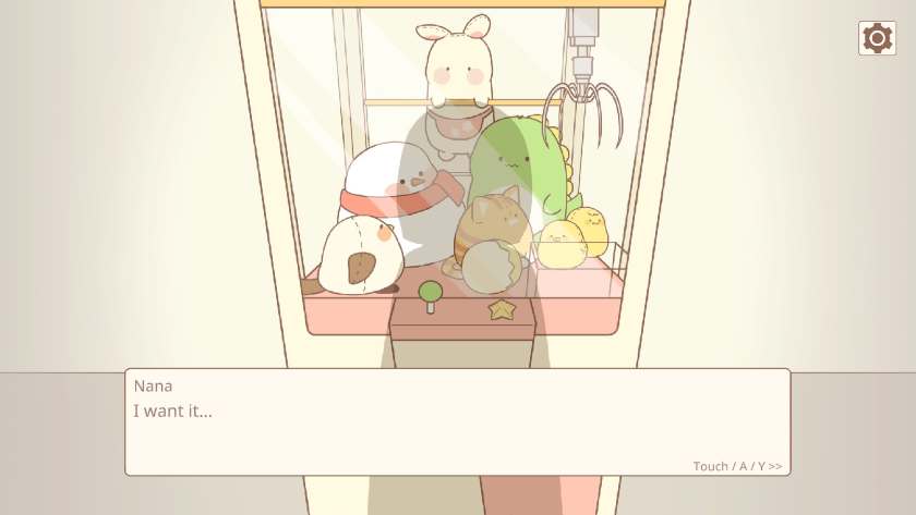 The shadow of Nana staring into the claw machine, filled with cute soft toys. She is saying “I want it...” Published on LadiesGamers