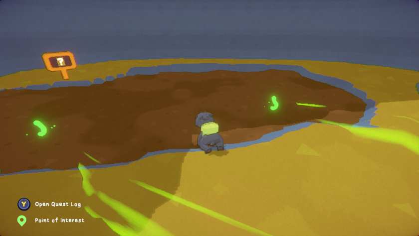 A mud puddle with worms in Tony The Mole