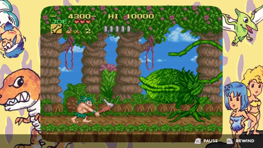 Screenshot showing a caveman about to attack a large Venus flytrap-like plant. The border has cartoon-style drawings of cave people and dinosaurs. Published on LadiesGamers