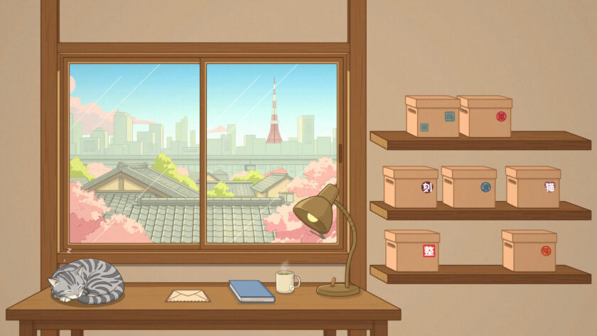 a desk in front of a window in Tokyo with boxes on the side and a sleeping cat on the desk.