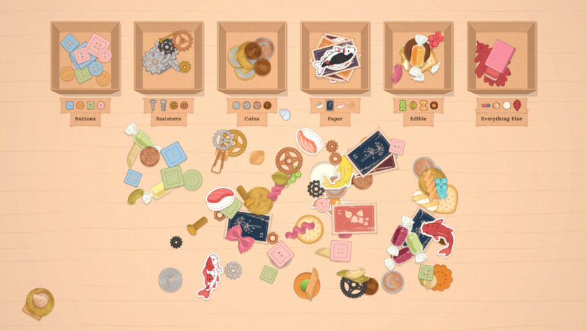 different small items in a pile with boxes to sort them into