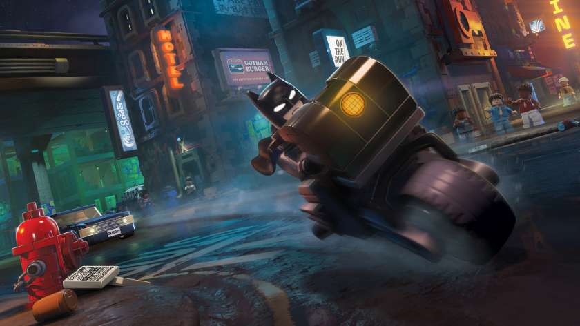 LEGO Batman on his Batcycle driving through Gotham. Image from Nintendo eShop, published on LadiesGamers