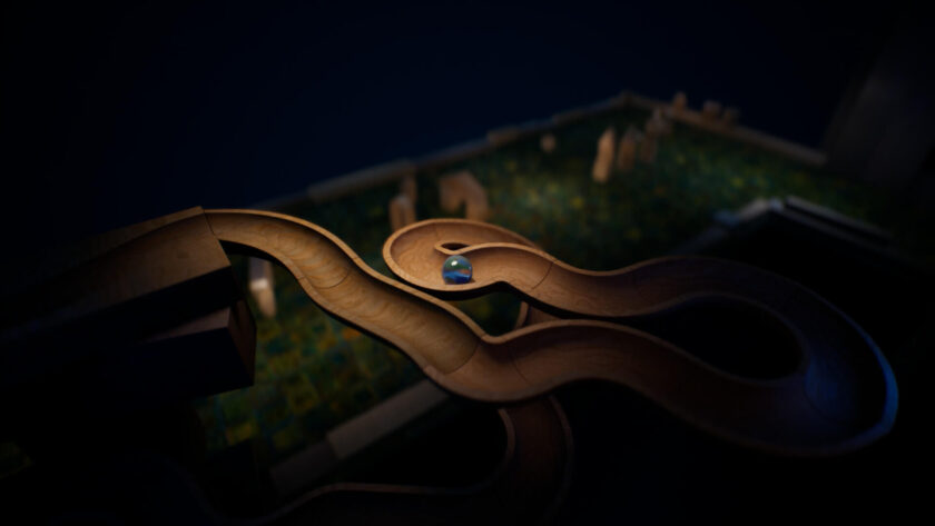 a marble run on a dark background